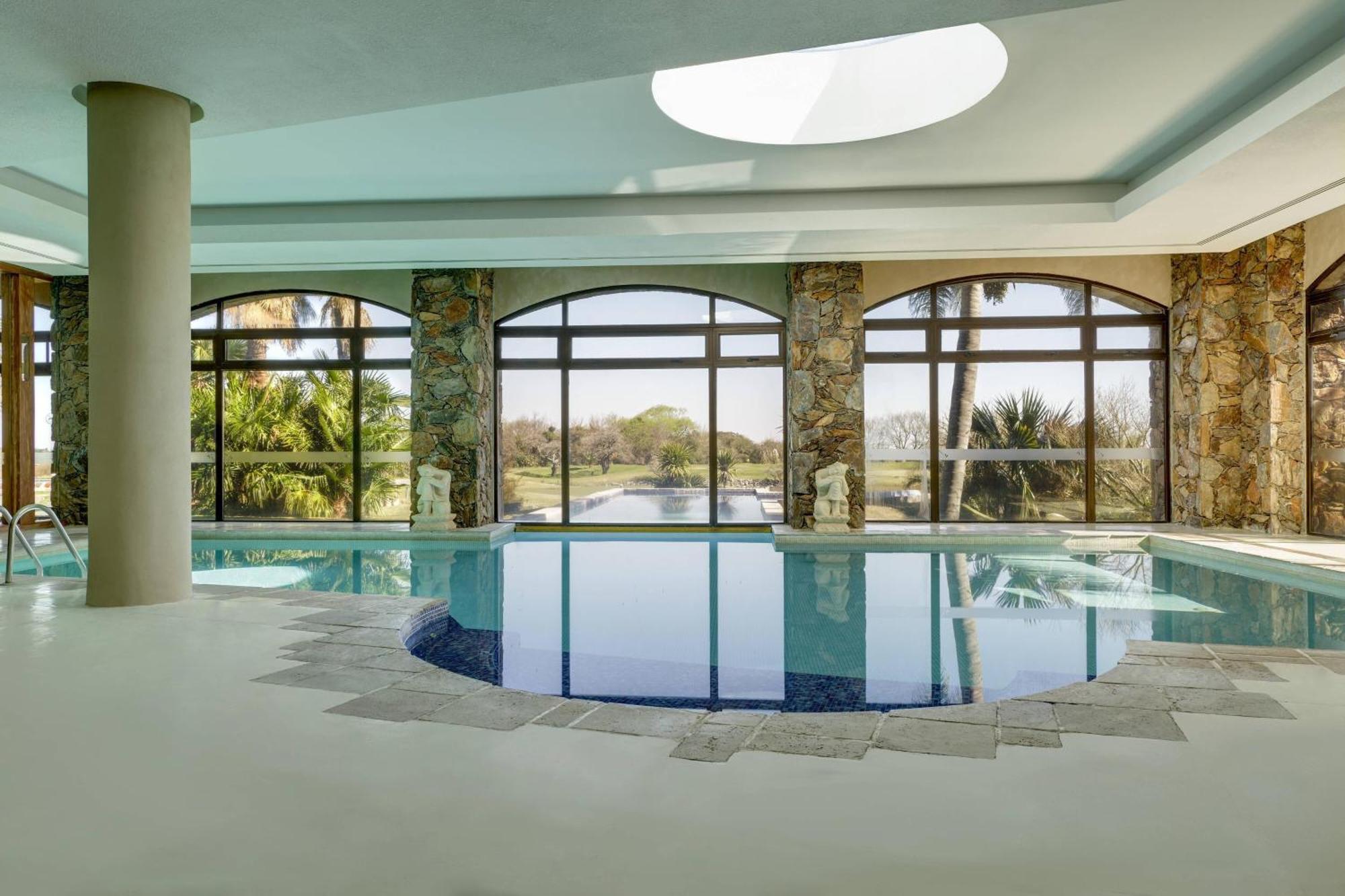 קולוניה דל סקרמנטו Sheraton Colonia Golf & Spa Resort מראה חיצוני תמונה The swimming pool at the hotel